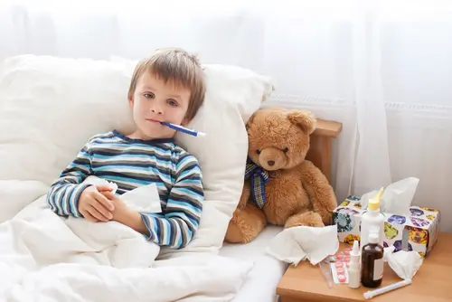 boy-thermometer-bed what is croup? what are the symptoms of croup?