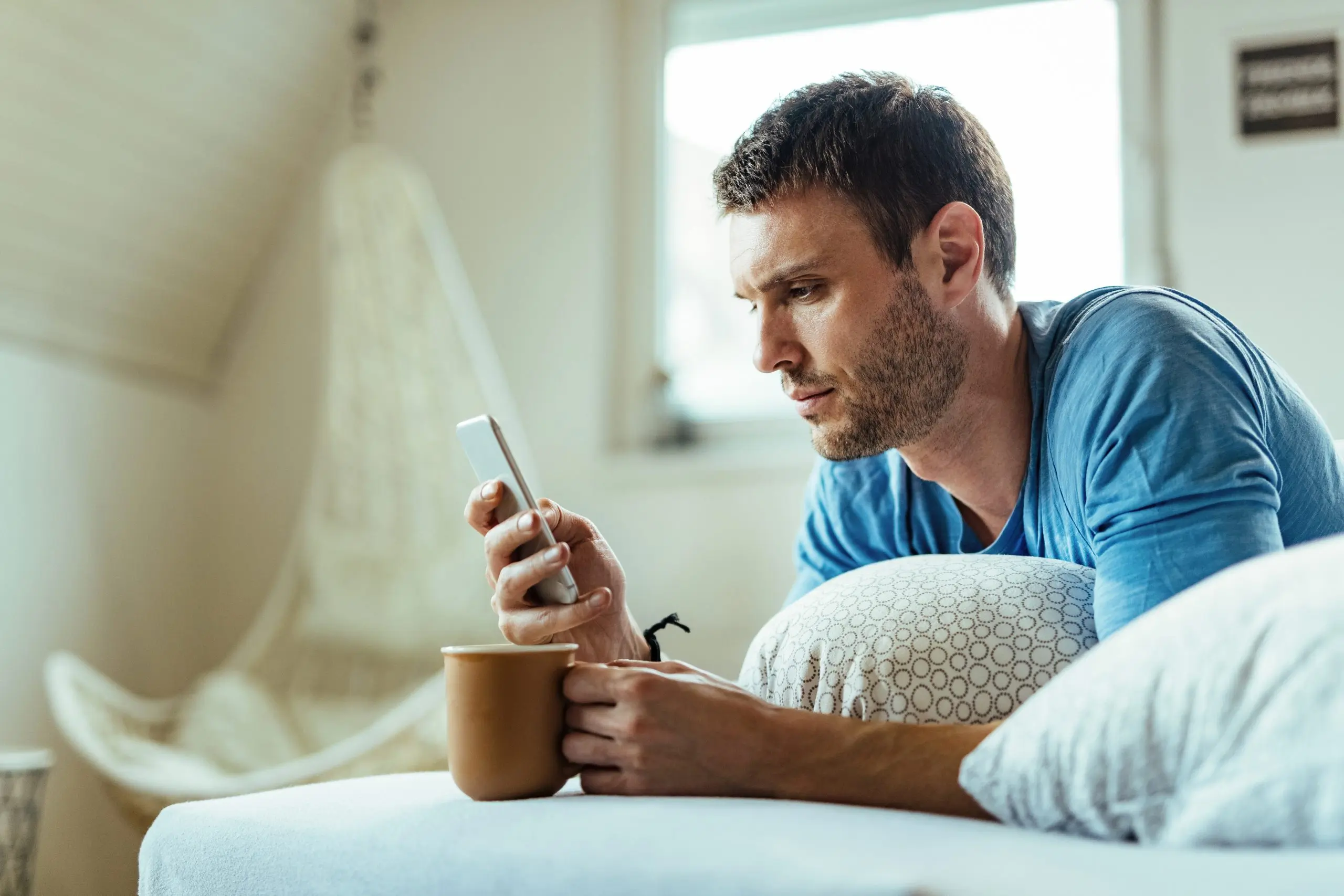 man-in-bed-chatting-on-video-call-with-a-doctor-scaled Video calls are often preferred because they allow the telehealth doctor to observe visual cues