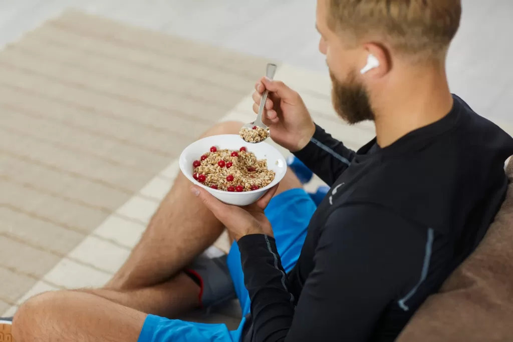 Man enjoying meal rich in fibre to prevent haemorrhoids