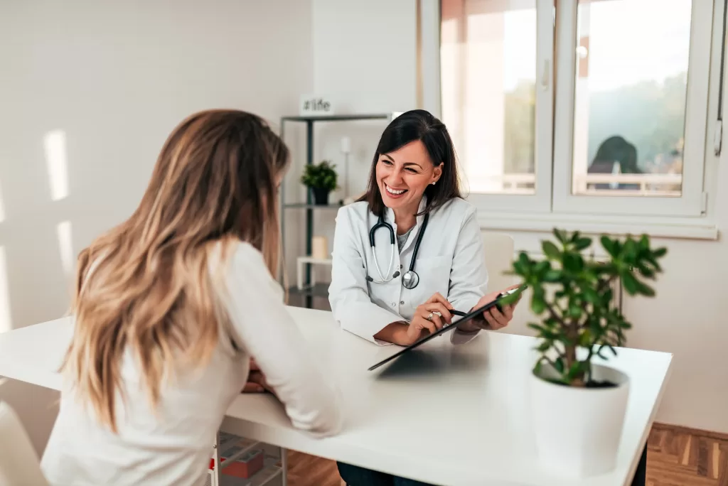 Female doctor explaining diagnosis to her patient