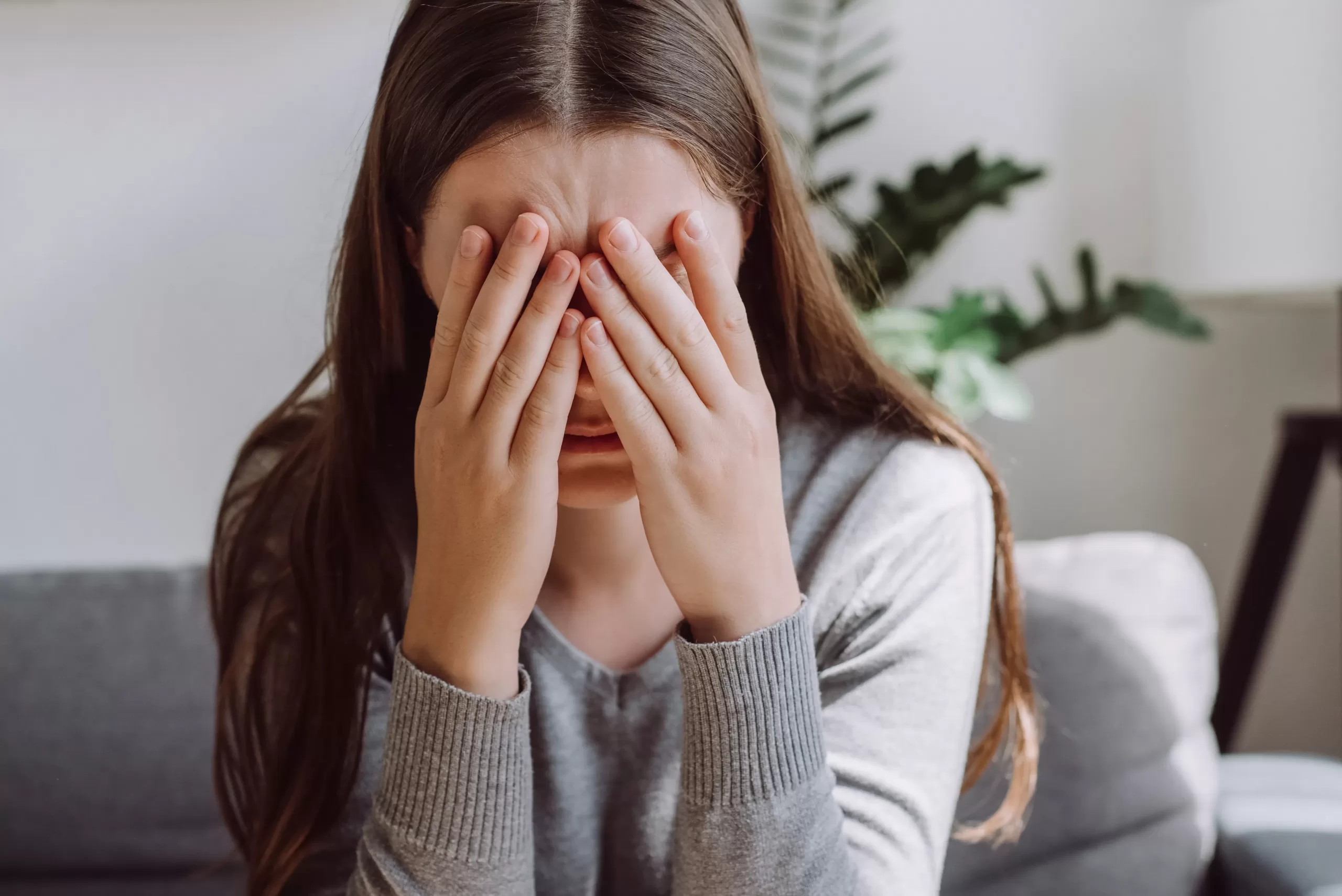Lost in thoughts stressed brunette female
